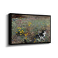 Angled view of Cat on a Flowery Meadow, 1887 by Bruno Liljefors in a black floater framed canvas.