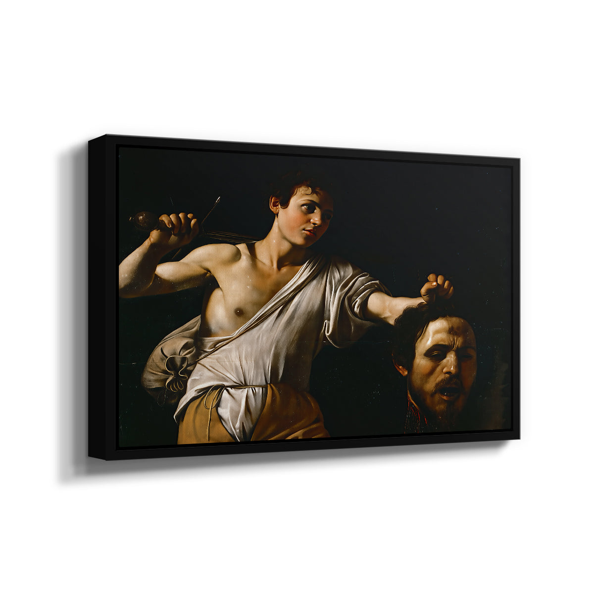 Angled view of David with the Head of Goliath (Vienna Version), c. 1607 by Caravaggio in a black floater framed canvas.