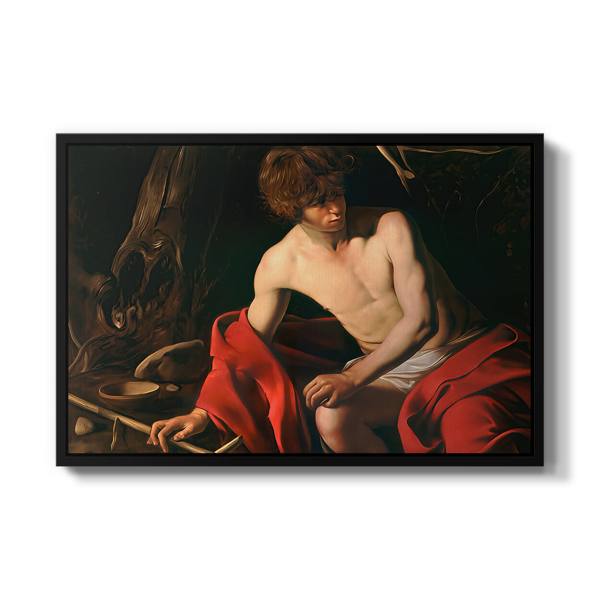 Saint John the Baptist in the Wilderness, c. 1603-1604 by Caravaggio in a black floater framed canvas wall art display.