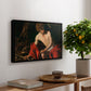 Saint John the Baptist in the Wilderness, c. 1603-1604 by Caravaggio, presented in a black floater framed canvas featuring a young Saint John seated in wilderness with staff and red drapery, displayed above a hallway console table.