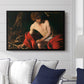 Saint John the Baptist in the Wilderness, c. 1603-1604 by Caravaggio displayed above a sofa in a living room in a black floater frame, featuring a solitary figure of Saint John resting in natural setting with soft light.