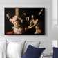 The Flagellation of Christ at the Column (Rouen Version), 1606 by Caravaggio displayed above a sofa in a living room in a black floater frame, featuring a dramatic religious scene of Christ enduring flagellation in dark interior.