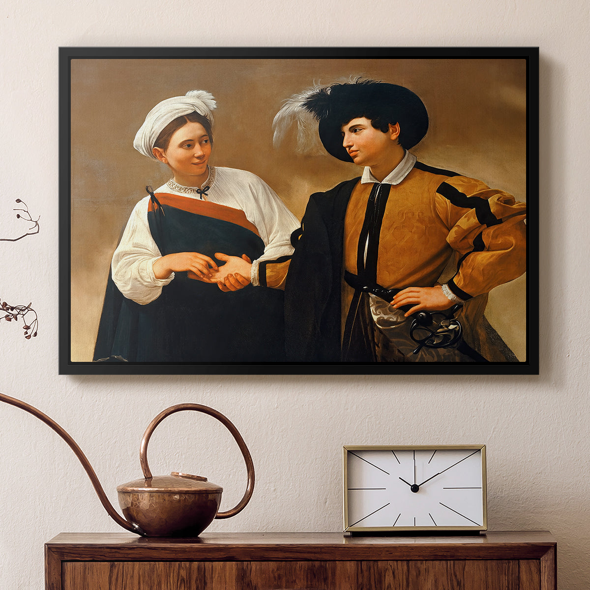 Black floater framed canvas featuring a close interaction between two figures involving deception and gesture, displayed above a cabinet in a soft-toned living room.