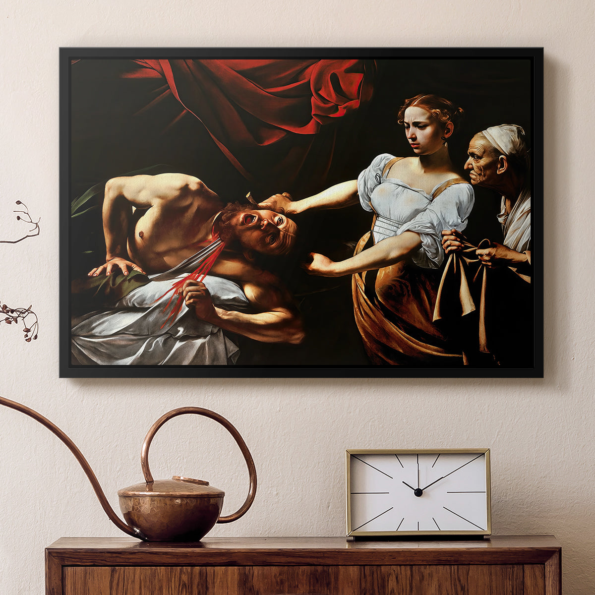 Black floater framed canvas featuring an intense moment of Judith slaying Holofernes with sword, displayed above a cabinet in a soft-toned living room.