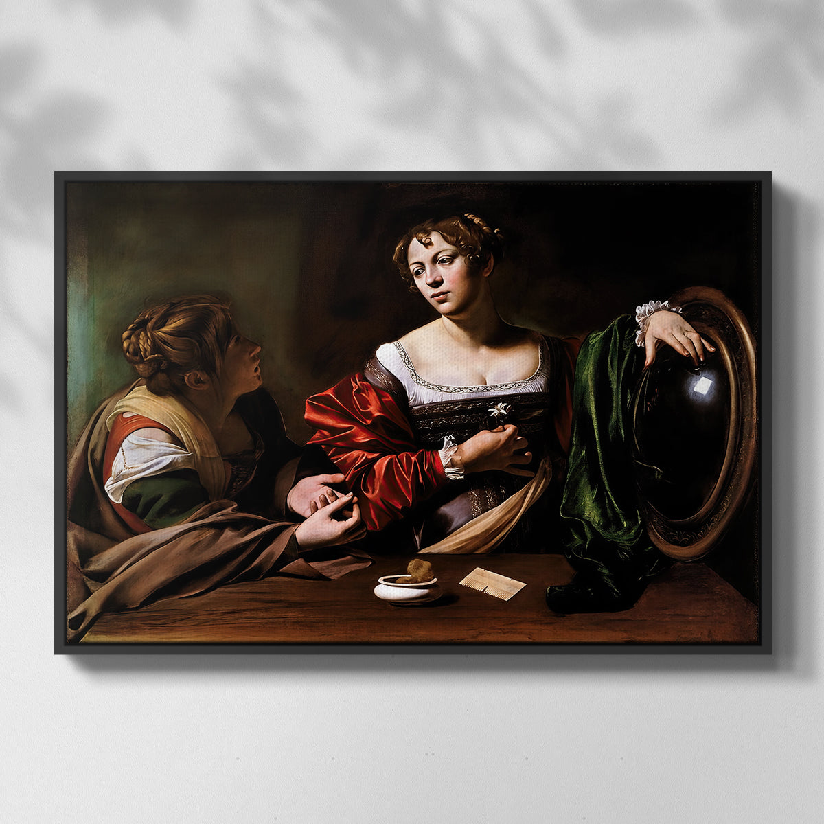 Front view of Martha and Mary Magdalene, c. 1598 by Caravaggio in a black floater framed canvas.