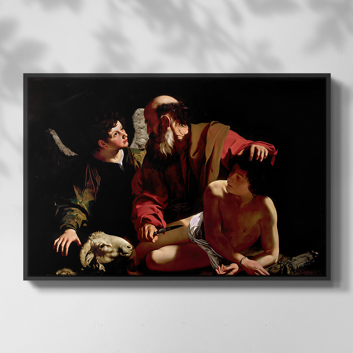 Front view of The Sacrifice of Isaac (Uffizi Version), c. 1603 by Caravaggio in a black floater framed canvas.