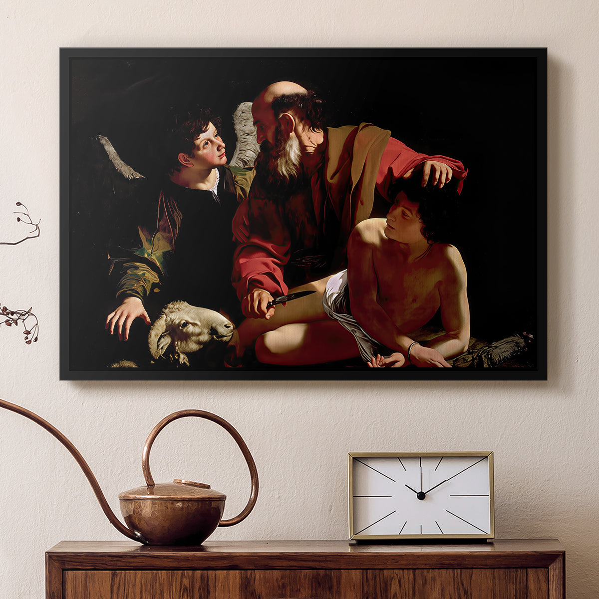 Black floater framed canvas featuring a dramatic moment of divine intervention during sacrifice of Isaac, displayed above a cabinet in a soft-toned living room.