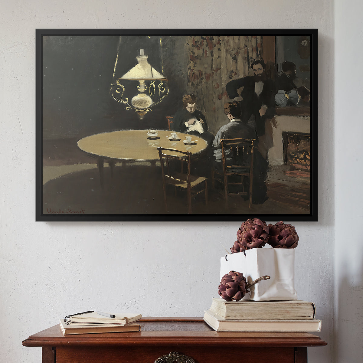 Black floater framed canvas featuring Interior, after Dinner, 1868-1869 by Claude Monet above an entryway table in a minimalist foyer.