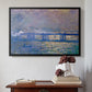 Black floater framed canvas featuring Charing Cross Bridge, 1903 by Claude Monet above an entryway table in a minimalist foyer.