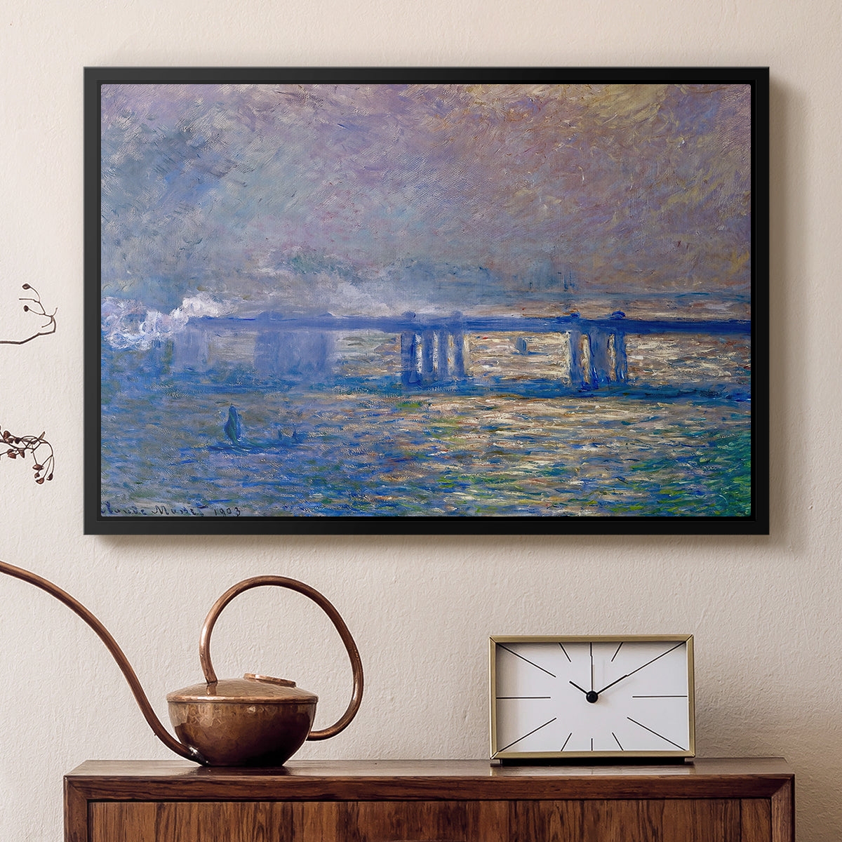 Black floater framed canvas featuring an atmospheric depiction of London bridge with reflections in water, displayed above a cabinet in a soft-toned living room.