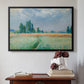 Black floater framed canvas featuring The Wheat Field (Champ de Blé), 1881 by Claude Monet above an entryway table in a minimalist foyer.