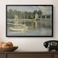The Bridge at Argenteuil, 1874 by Claude Monet in a black floater framed canvas displayed above a console table in a hallway, featuring a riverside view with architecture and nautical activity.
