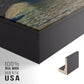 Close-up of the black floater frame corner and gallery wrapped canvas construction.