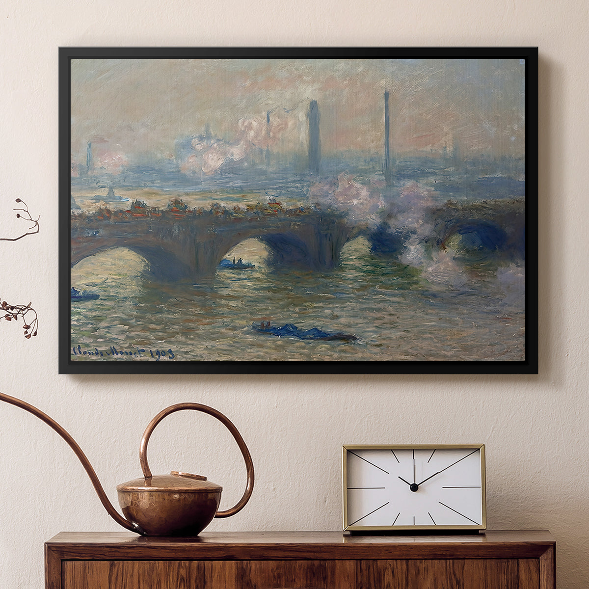 Black floater framed canvas featuring a river and bridge scene with diffused light and urban backdrop, displayed above a cabinet in a soft-toned living room.
