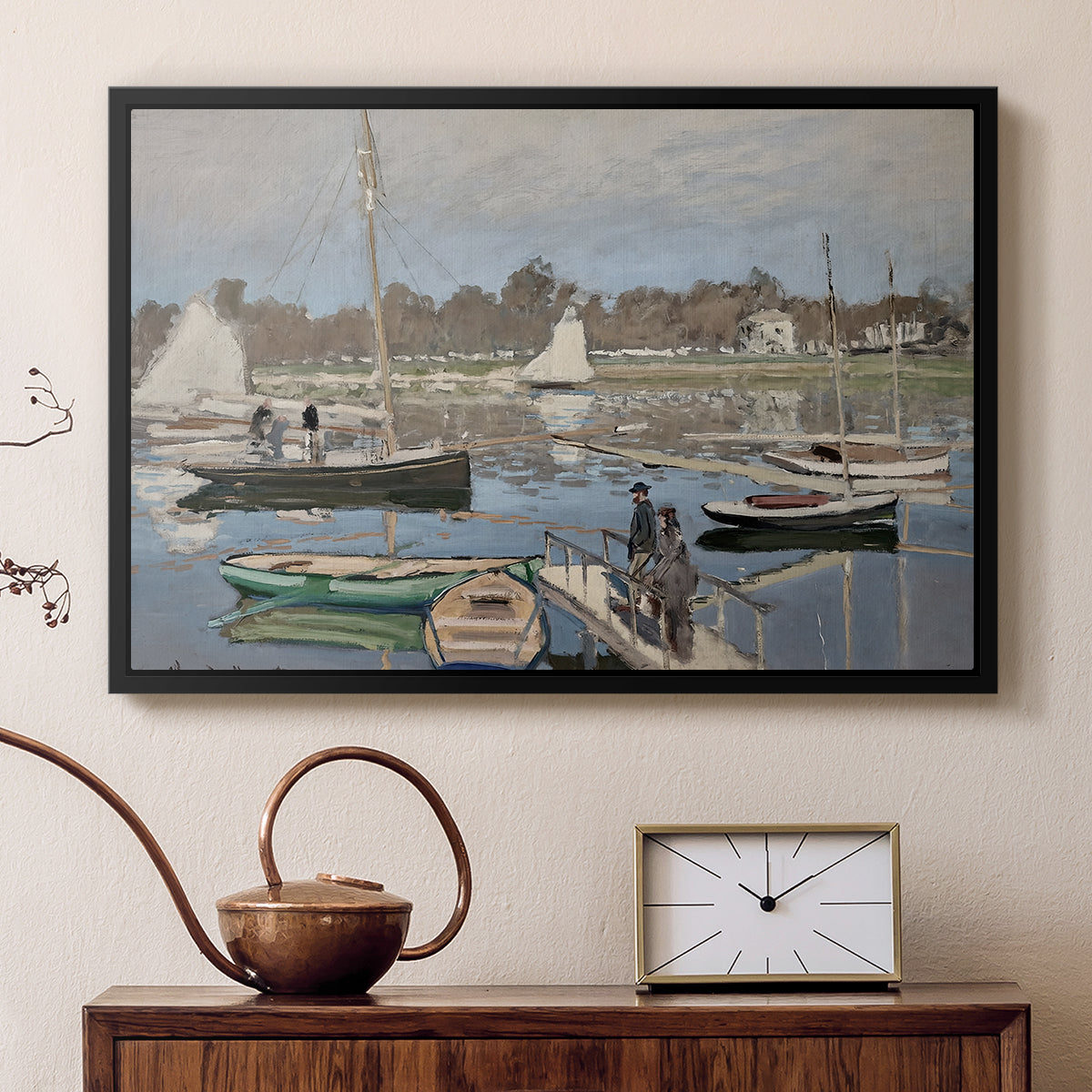Black floater framed canvas featuring a harbor basin filled with boats under soft sky, displayed above a cabinet in a soft-toned living room.