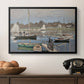 The Basin at Argenteuil, 1874 by Claude Monet in a black floater framed canvas displayed above a console table in a hallway, featuring a tranquil river setting with sailboats and shoreline.