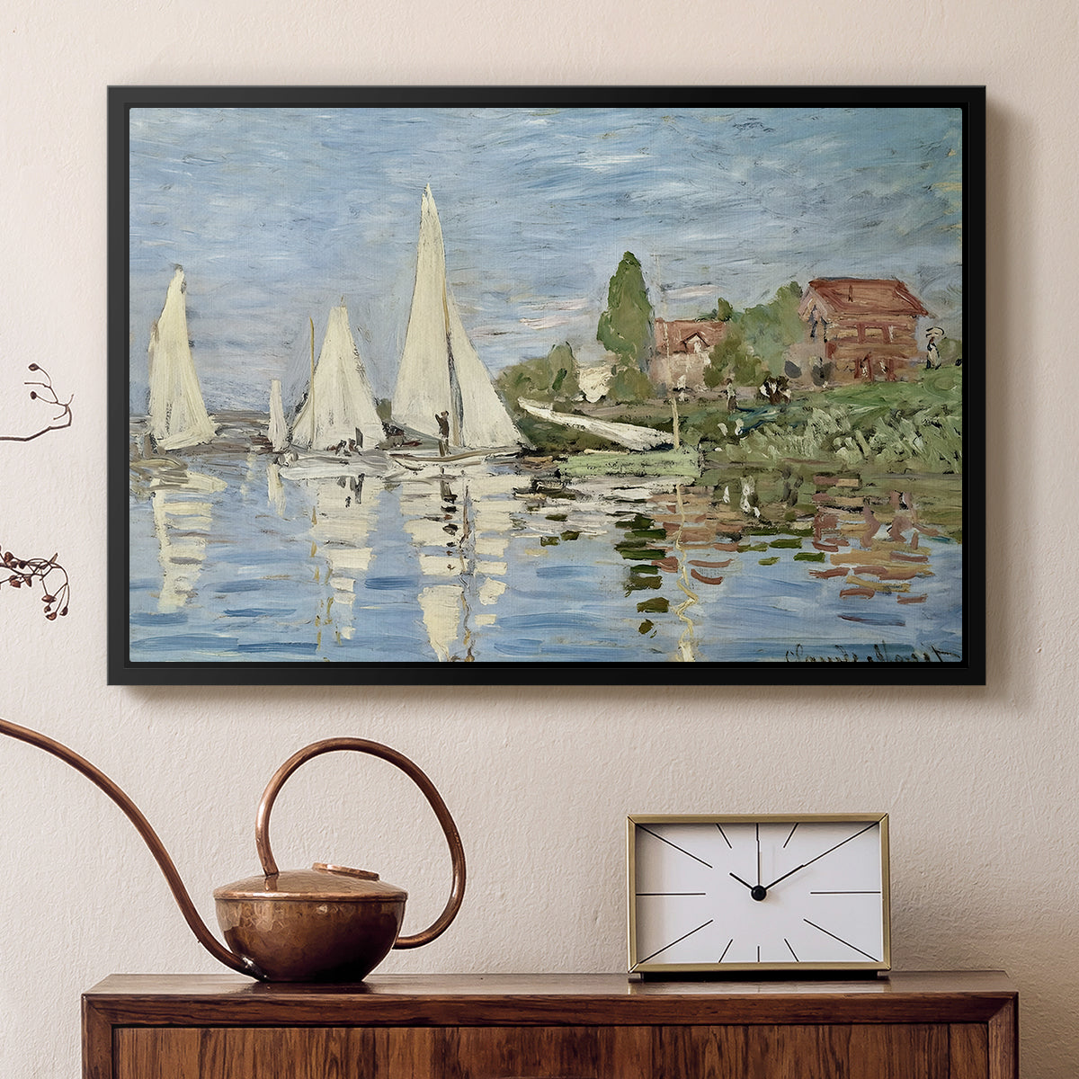 Black floater framed canvas featuring an impressionist depiction of sailing competition on water, displayed above a cabinet in a soft-toned living room.