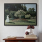 Black floater framed canvas featuring Woman in the Garden, Sainte-Adresse, 1867 by Claude Monet above an entryway table in a minimalist foyer.