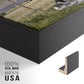 Close-up of the black floater frame corner and gallery wrapped canvas construction.