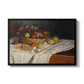 Still Life with Apples and Grapes, 1880 by Claude Monet in a black floater framed canvas wall art display.