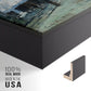 Close-up of the black floater frame corner and gallery wrapped canvas construction.