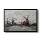 Windmills near Zaandam, 1871 by Claude Monet in a black floater framed canvas wall art display.