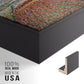 Close-up of the black floater frame corner and gallery wrapped canvas construction.