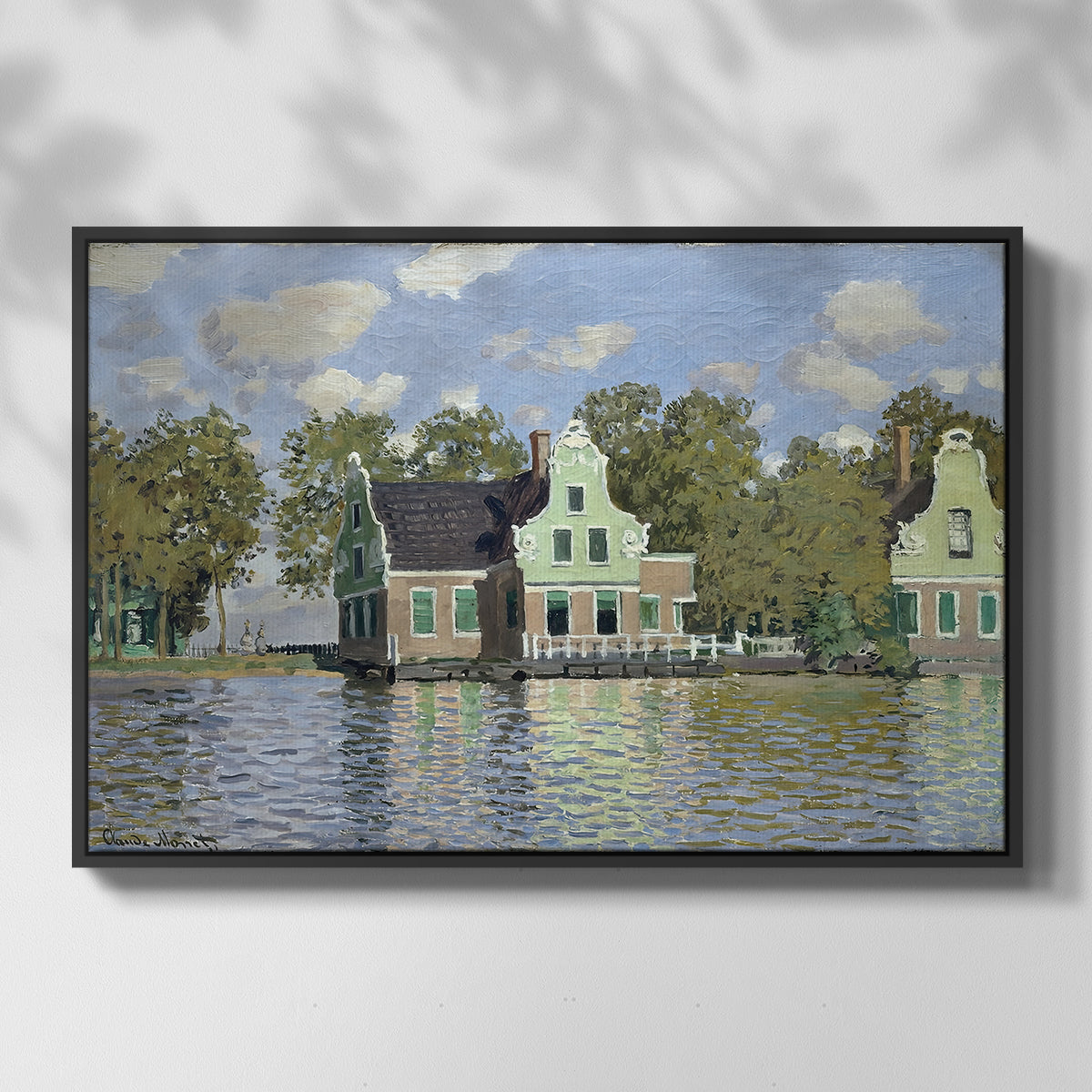 Front view of Houses on the Zaan River at Zaandam, 1871 by Claude Monet in a black floater framed canvas.