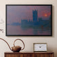 Black floater framed canvas featuring an atmospheric London scene with buildings fading into haze, displayed above a cabinet in a soft-toned living room.