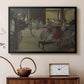 Black floater framed canvas featuring an impressionist studio interior filled with ballet students, displayed above a cabinet in a soft-toned living room.