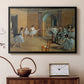 Black floater framed canvas featuring an impressionist depiction of ballet foyer with multiple figures, displayed above a cabinet in a soft-toned living room.