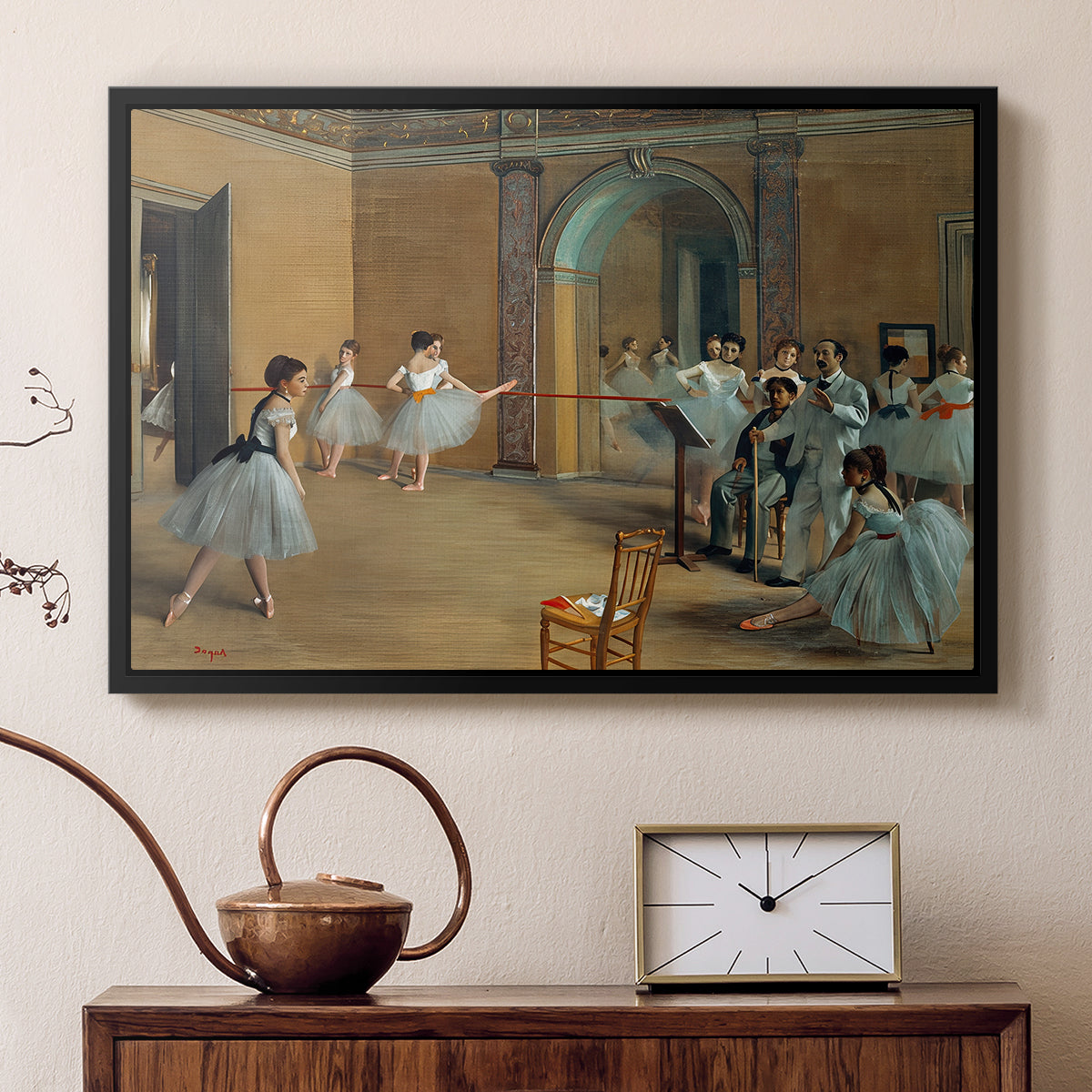 Black floater framed canvas featuring an impressionist depiction of ballet foyer with multiple figures, displayed above a cabinet in a soft-toned living room.