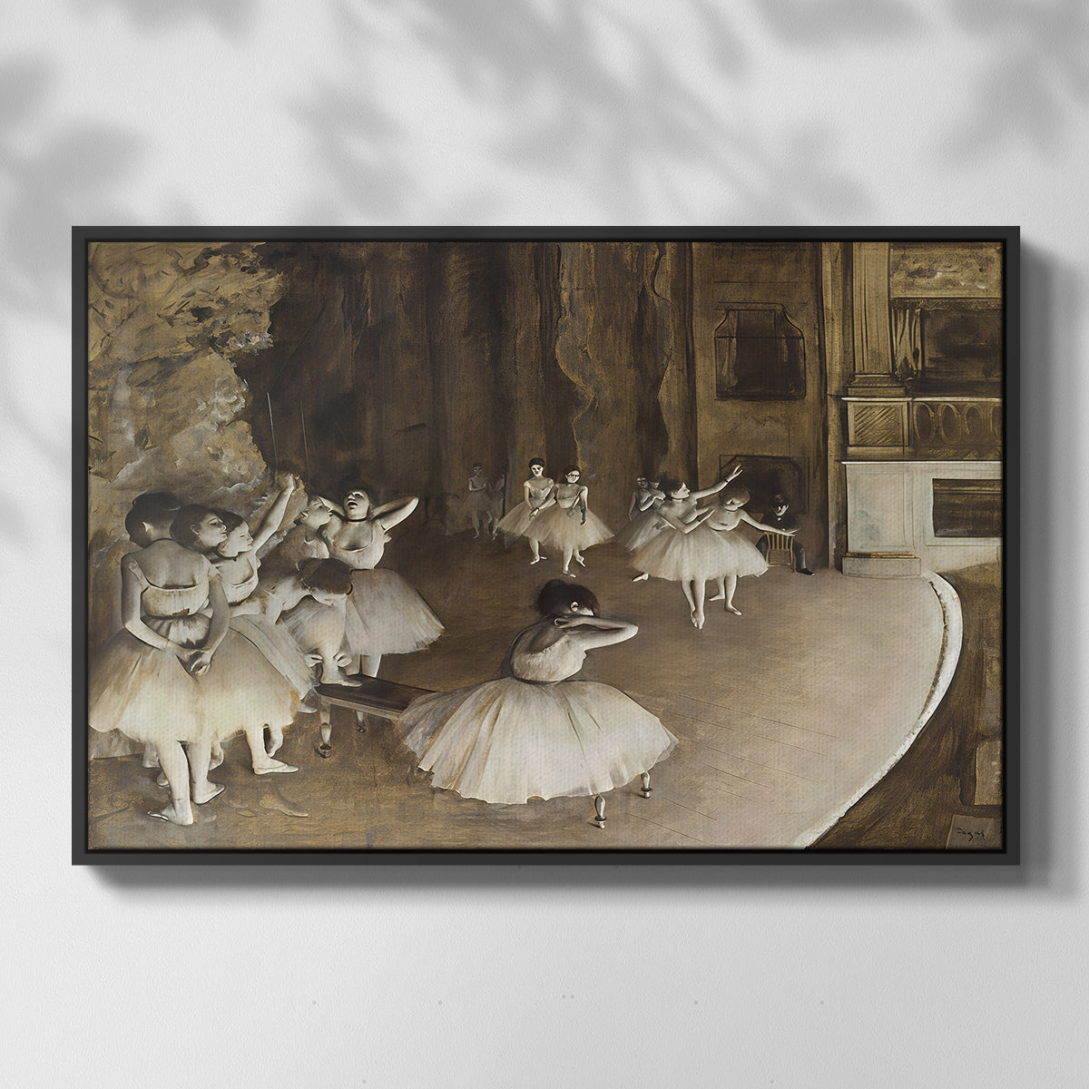 Front view of The Rehearsal of the Ballet Onstage, 1874 by Edgar Degas in a black floater framed canvas.