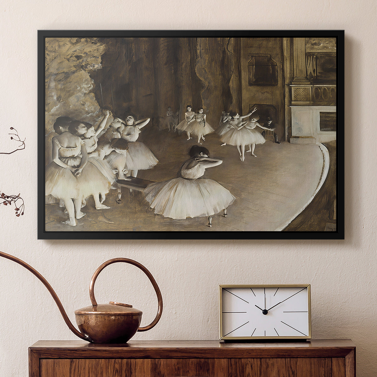 Black floater framed canvas featuring an impressionist depiction of ballet practice on theater stage, displayed above a cabinet in a soft-toned living room.