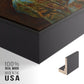 Close-up of the black floater frame corner and gallery wrapped canvas construction.