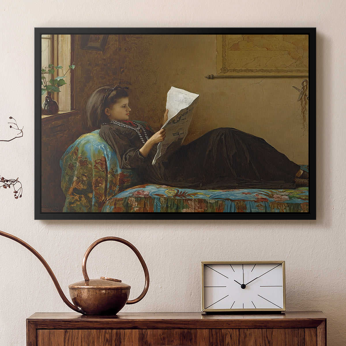 Black floater framed canvas featuring an Americana interior with people focused on printed page, displayed above a cabinet in a soft-toned living room.