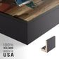 Close-up of the black floater frame corner and gallery wrapped canvas construction.