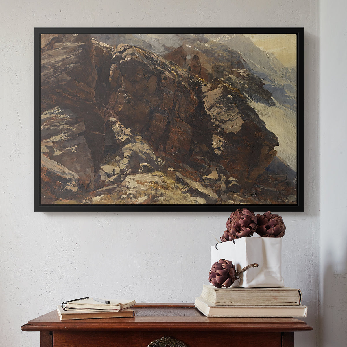 Black floater framed canvas featuring High Mountain Study, c. 1870 by Edward Theodore Compton above an entryway table in a minimalist foyer.
