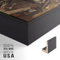 Close-up of the black floater frame corner and gallery wrapped canvas construction.