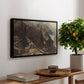 High Mountain Study, c. 1870 by Edward Theodore Compton, presented in a black floater framed canvas featuring a rocky alpine terrain with steep slopes and distant mountain peaks, displayed above a hallway console table.