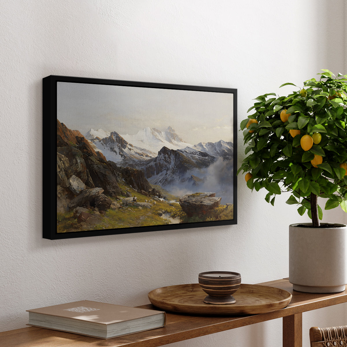 The Großglockner from the Prager Hut, 1890 by Edward Theodore Compton, presented in a black floater framed canvas featuring a view of Großglockner peak from alpine hut overlooking valley, displayed above a hallway console table.