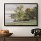 Landscape at Lake Starnberg, 1890 by Edward Theodore Compton in a black floater framed canvas displayed above a console table in a hallway, featuring a tranquil lakeside view with soft atmospheric tones.