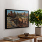 Palatine in Rome, c. 1921 by Edward Theodore Compton, presented in a black floater framed canvas featuring historic Roman ruins and buildings set within warm landscape, displayed above a hallway console table.