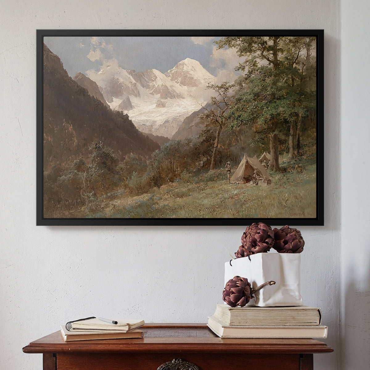 Black floater framed canvas featuring Landscape in the Caucasus, c. 1921 by Edward Theodore Compton above an entryway table in a minimalist foyer.