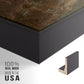 Close-up of the black floater frame corner and gallery wrapped canvas construction.