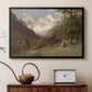 Black floater framed canvas featuring a natural scene with valleys and rocky formations, displayed above a cabinet in a soft-toned living room.