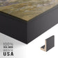 Close-up of the black floater frame corner and gallery wrapped canvas construction.