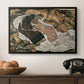 Death and the Maiden, 1915 by Egon Schiele in a black floater framed canvas displayed above a console table in a hallway, featuring an intense composition exploring life and death through figures.