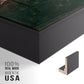 Close-up of the black floater frame corner and gallery wrapped canvas construction.