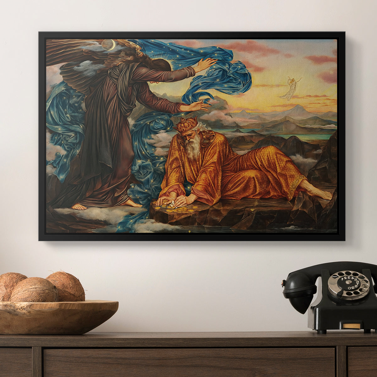 Earthbound, 1897 by Evelyn De Morgan in a black floater framed canvas displayed above a console table in a hallway, featuring a classical-style figure lying in ornate, mystical environment.
